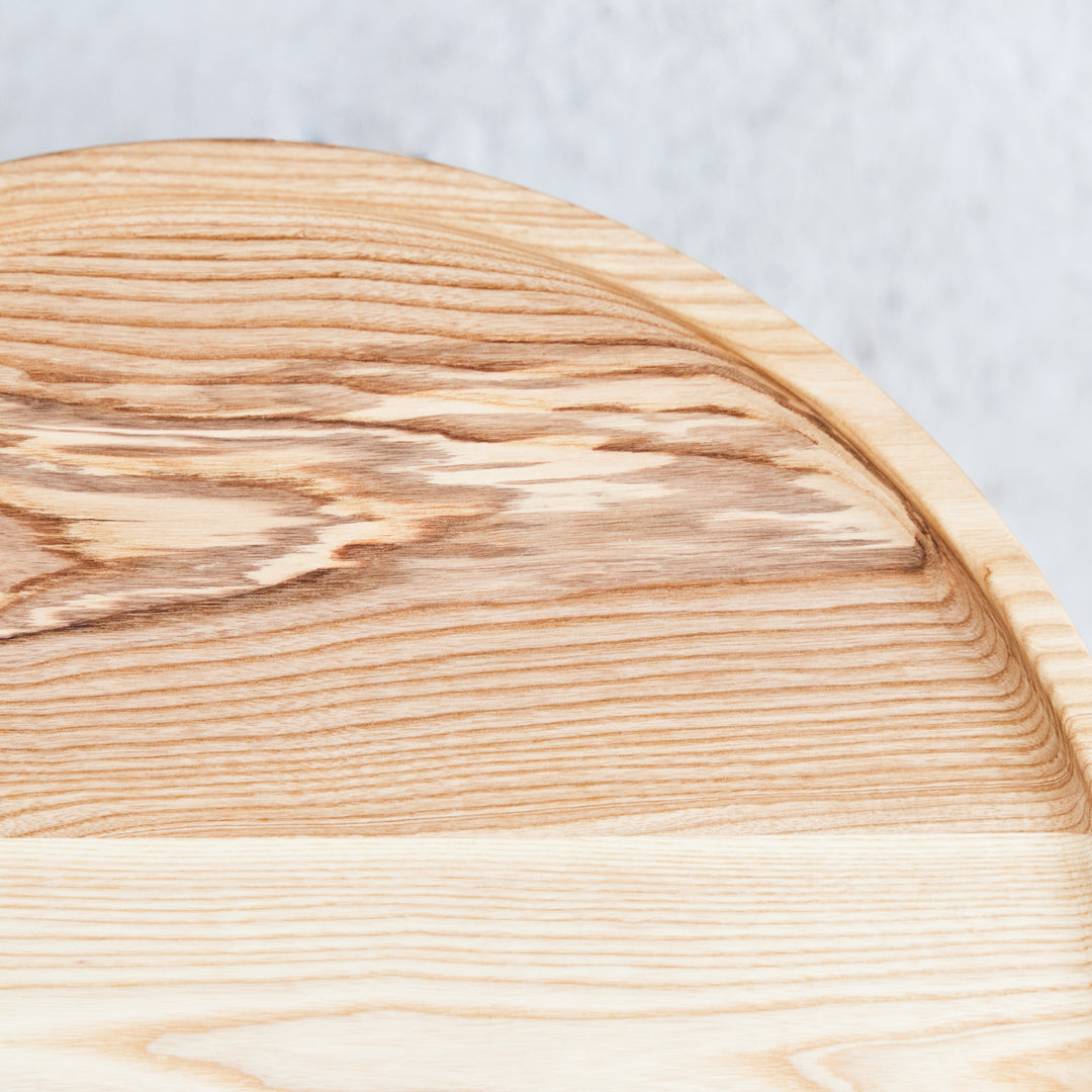 Detail image of the Goldfinger Bower coffee table pair, made from sustainable, handcrafted ash