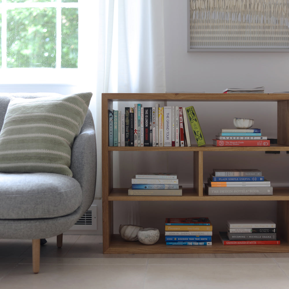 The sustainable, solid wood Goldfinger x Inhabit bookshelf in situ at Inhabit Hotels.