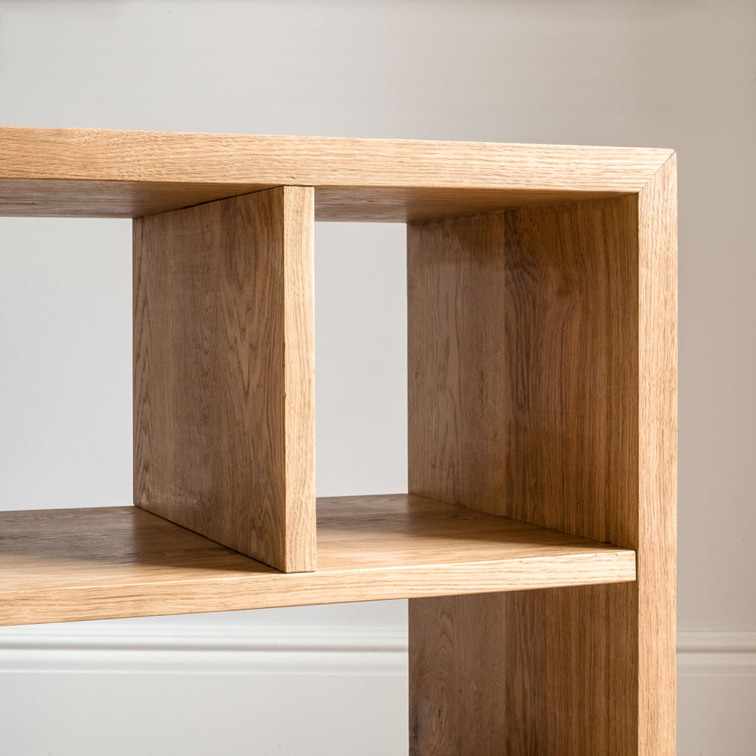 Detail view of the Goldfinger x Inhabit bookshelf made from solid wood, sustainable furniture